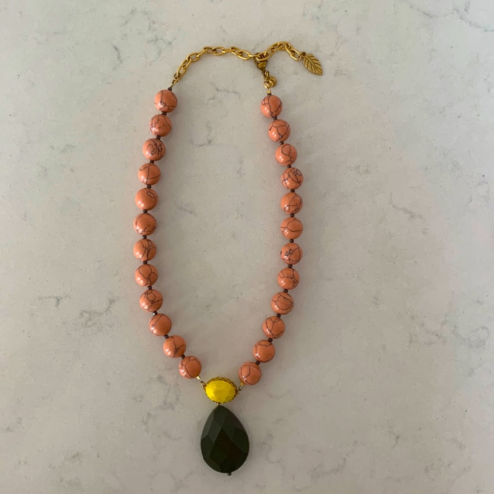 David Aubrey necklace with pink beads and yellow and brown pendant drop.